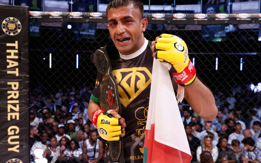 Shaj Haque with CW flyweight belt