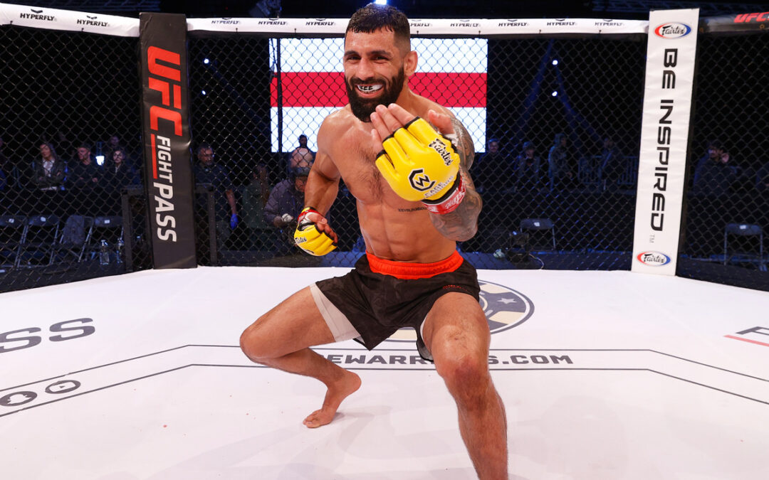 Aiden Lee Celebrates in the Cage at CW Unplugged