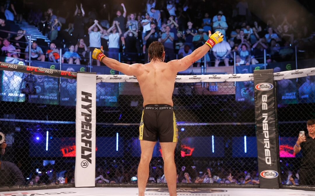 Nik Bagley Celebrates in the Cage